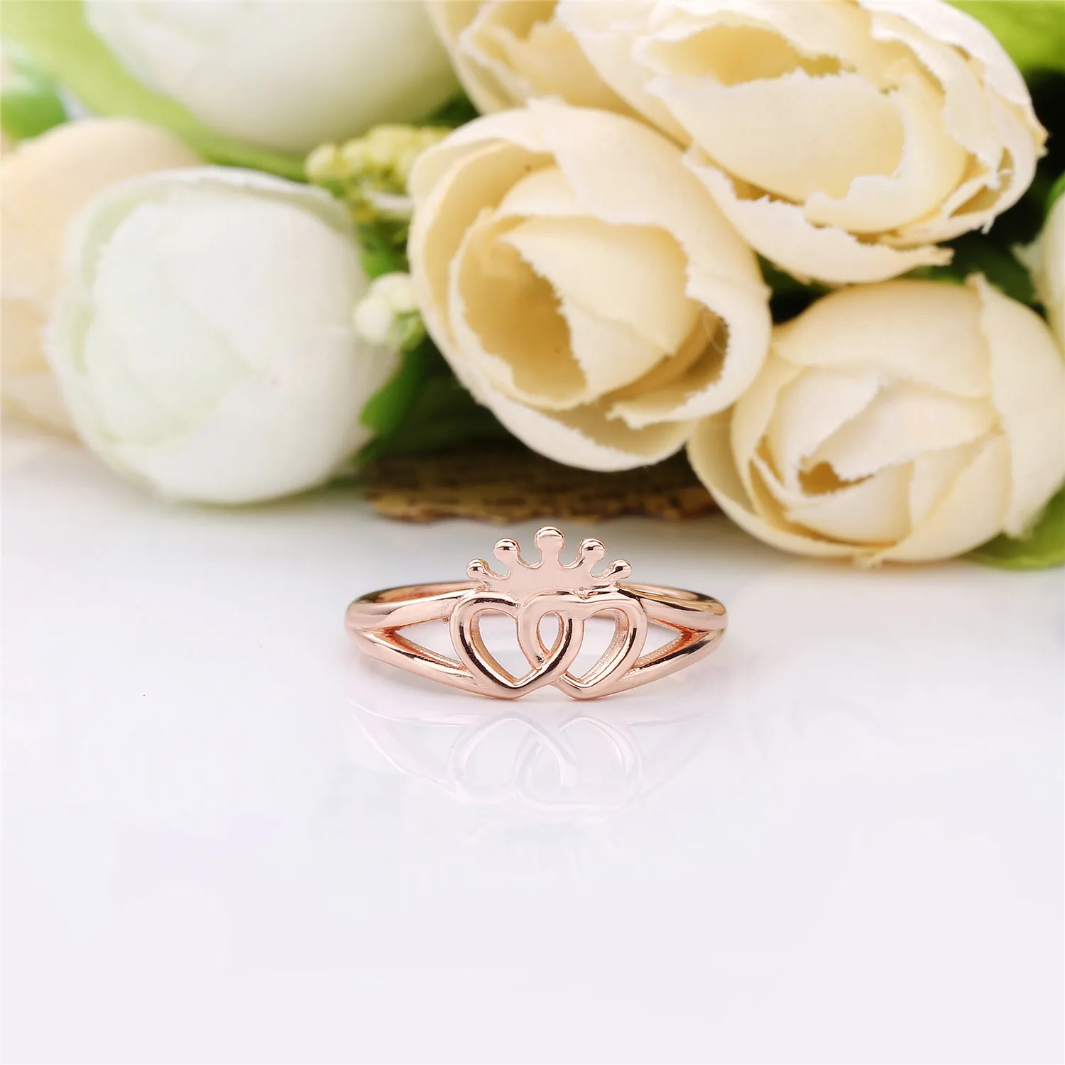 Interlocked crowned hearts PANDORA Rose ring - 187685