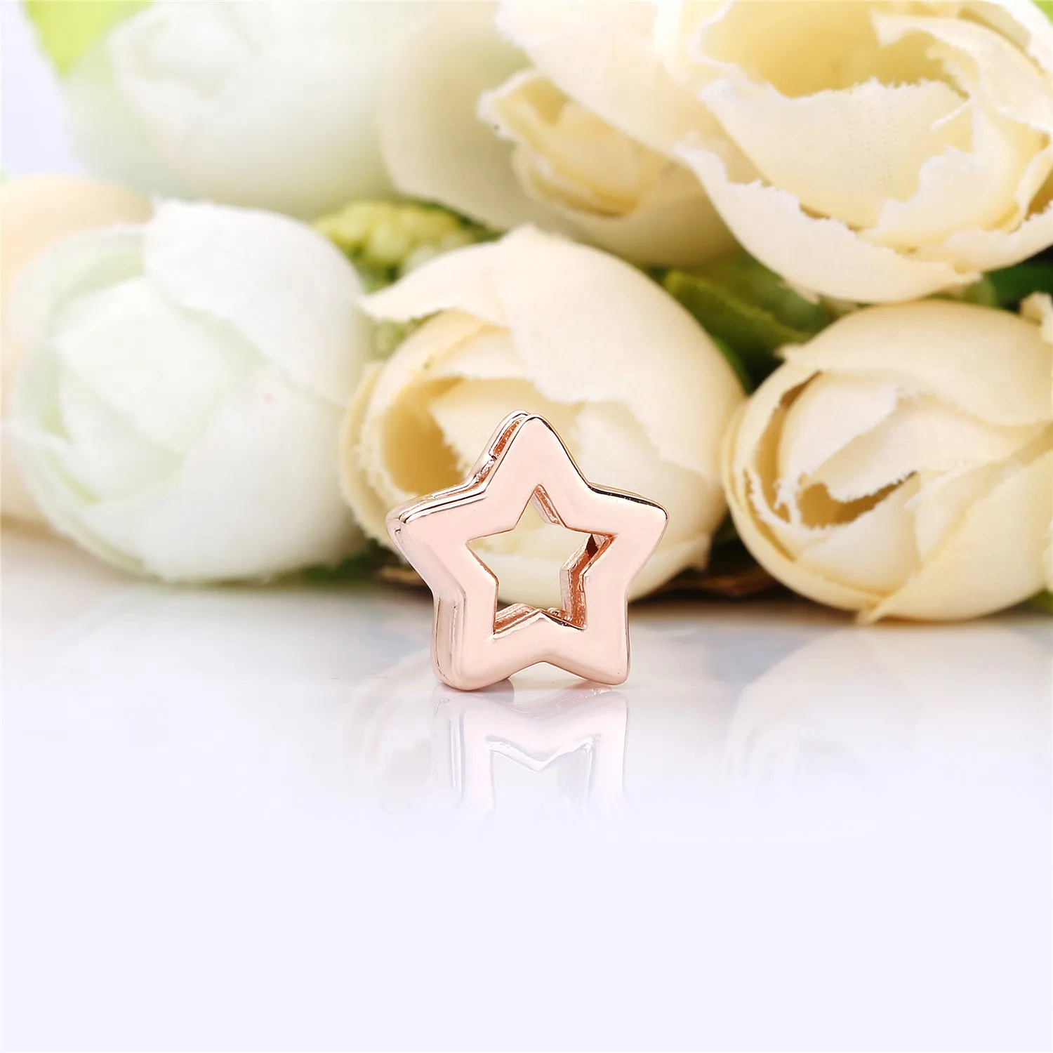 PANDORA Reflexions star clip charm in PANDORA Rose - 787544