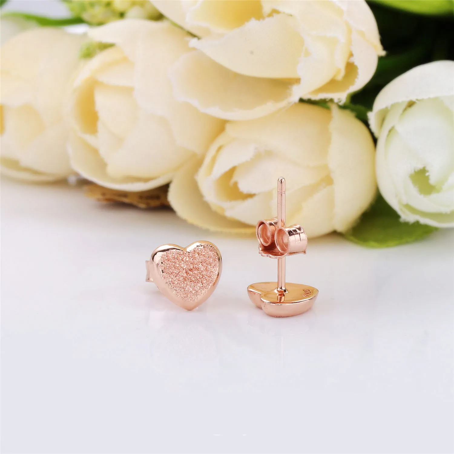 Heart stud earrings in diamond-pointed Pandora Rose - 287928