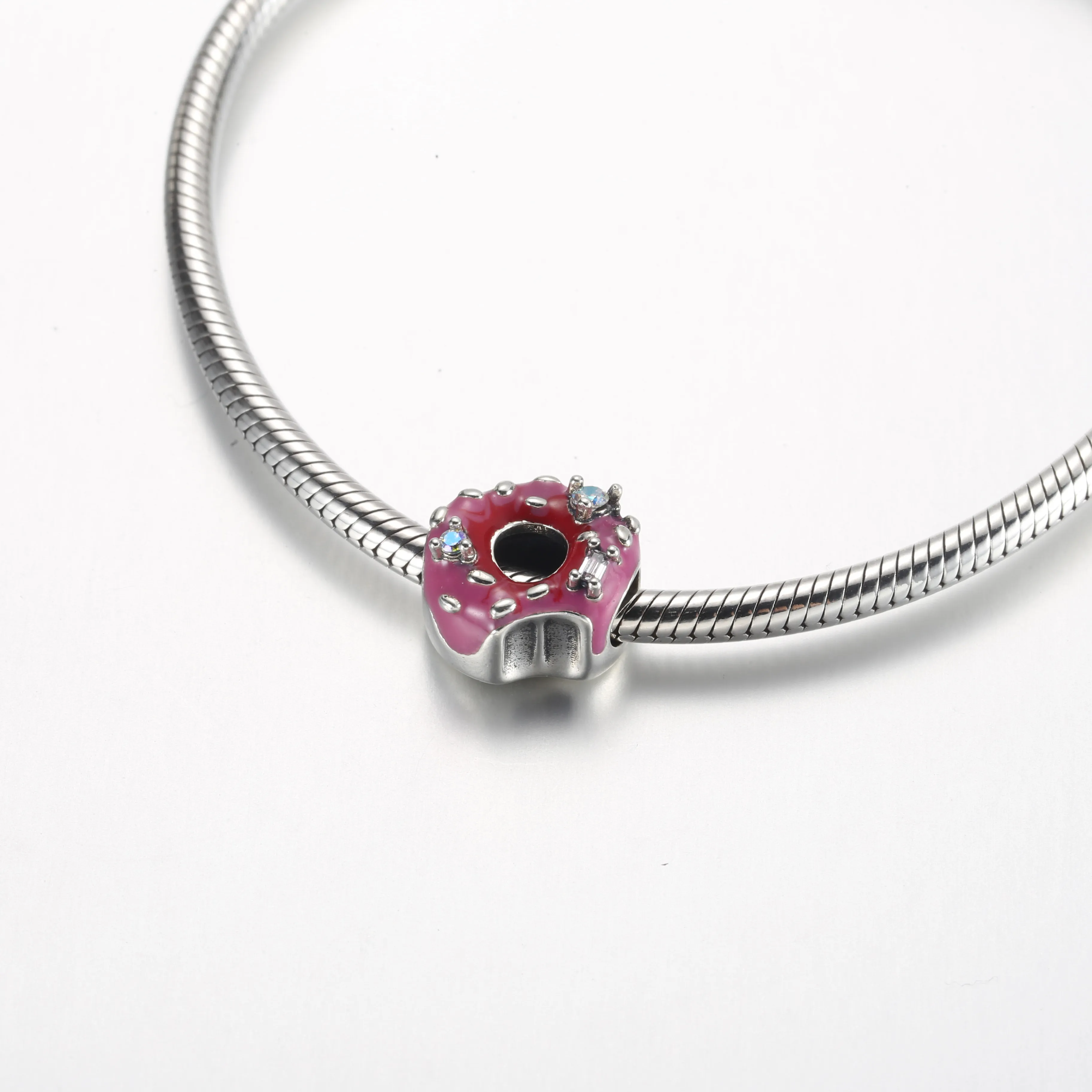 Pandora Donut sterling silver charm with aurora borelalis cubic zirconia, clear cubic zirconia and shaded pink enamel - 792596C01