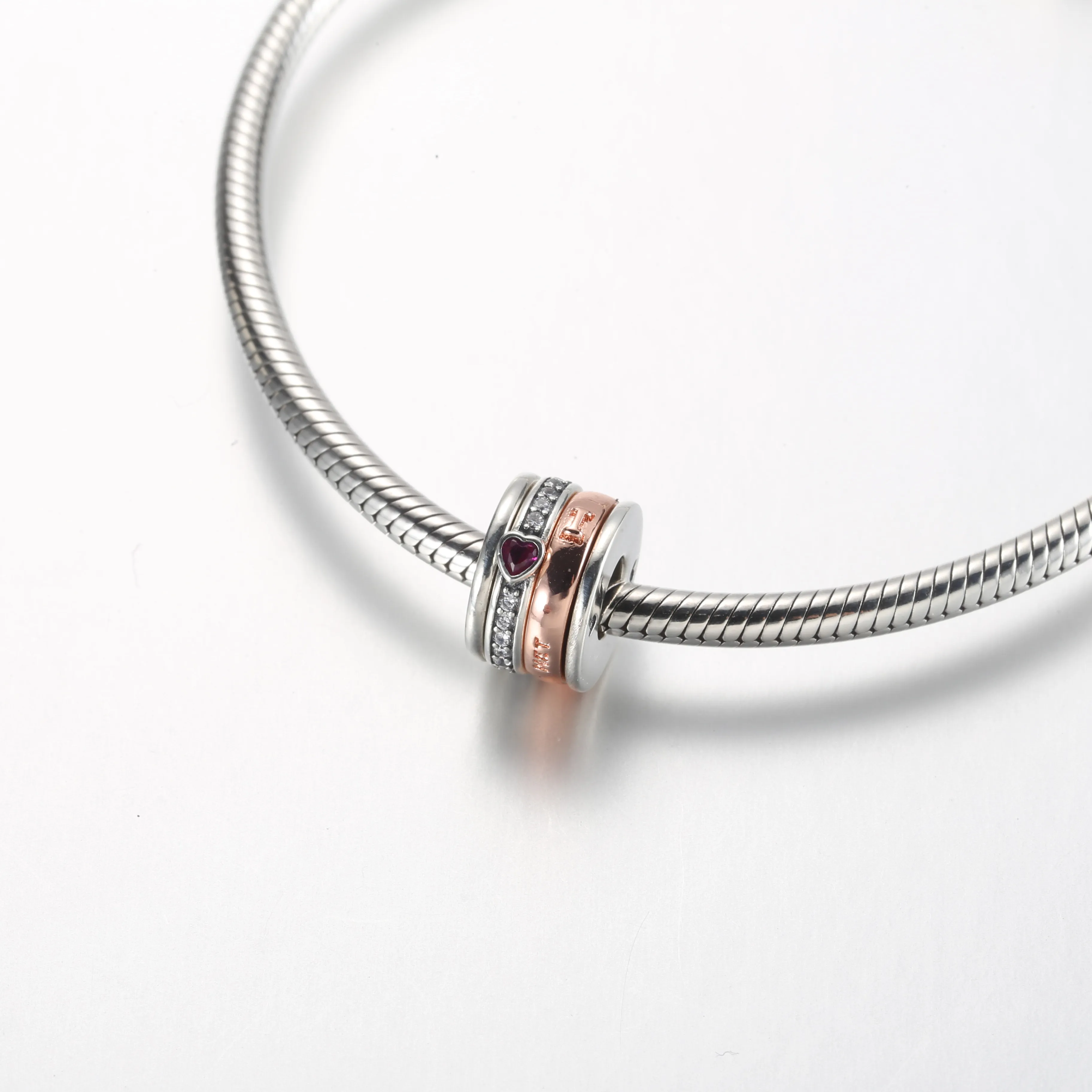 Pandora Turning I love you sterling silver and 14k rose gold-plated charm with red and clear cubic zirconia - 782639C01