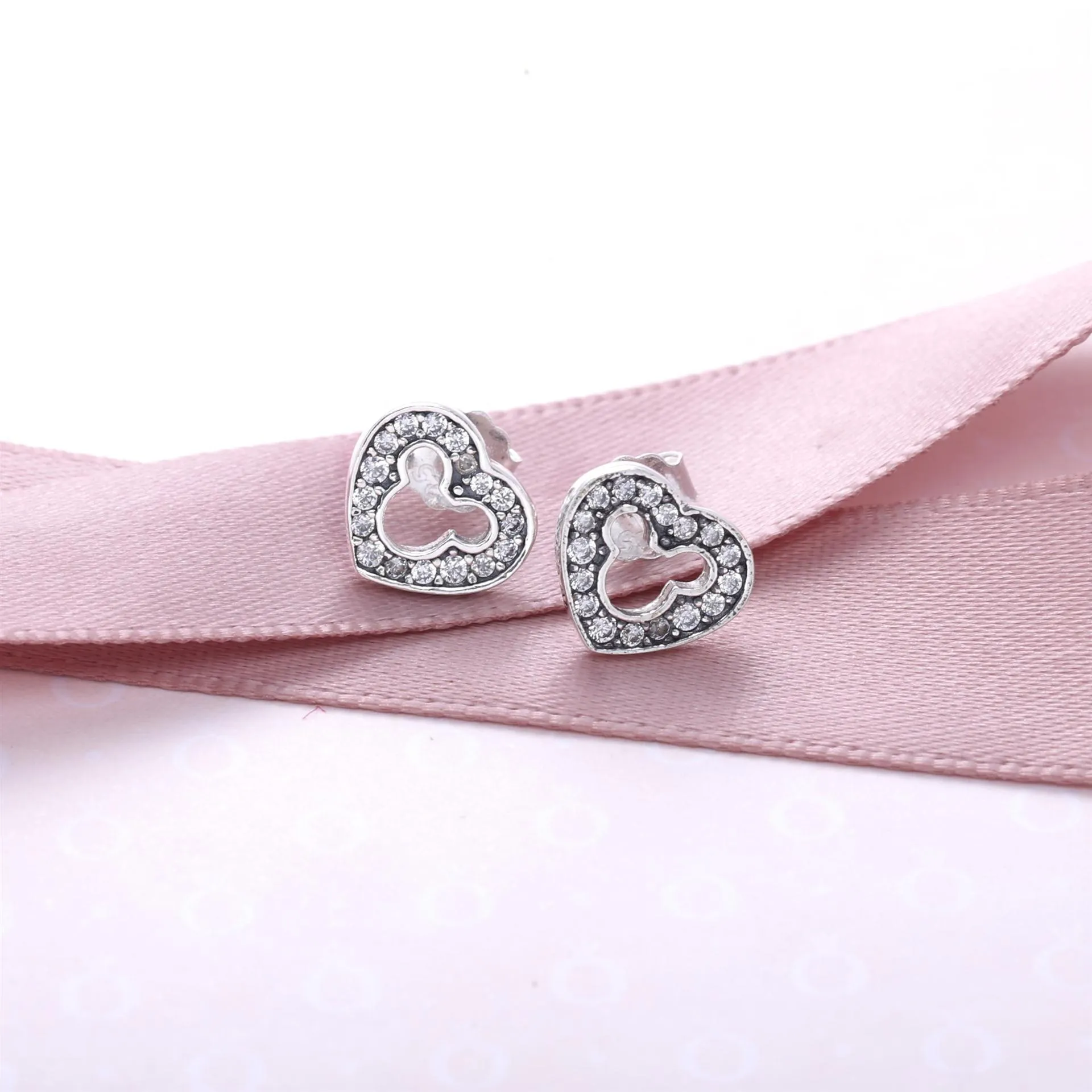 Pandora Disney heart silver stud earrings with cubic zirconia and cut-out Mickey silhouette - 290579CZ